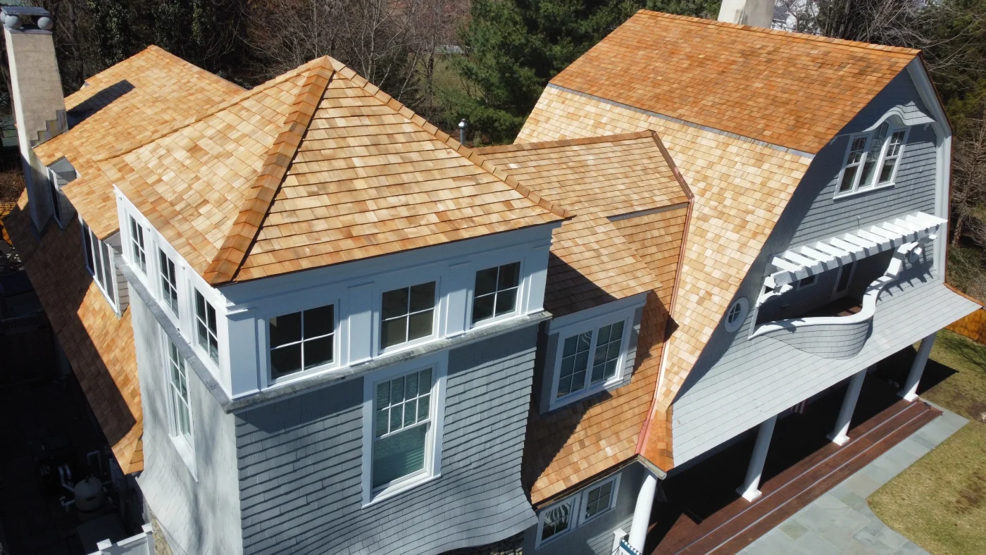 Durable Residential Roof Replacement In Norwalk, CT | Sound Renovation A cedar roof on a beautiful classic home in the area.