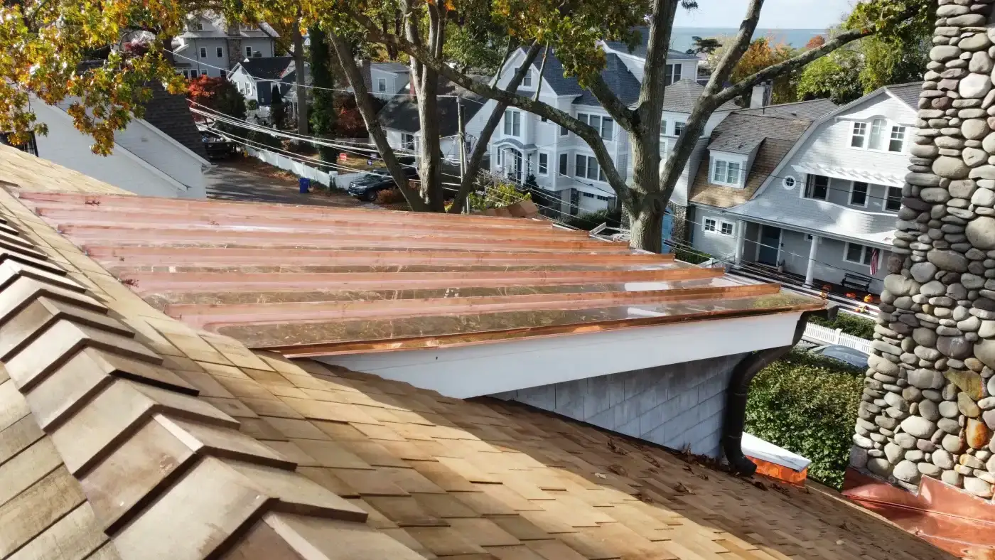 A close view of the copper used for a roofing feature on a local home.