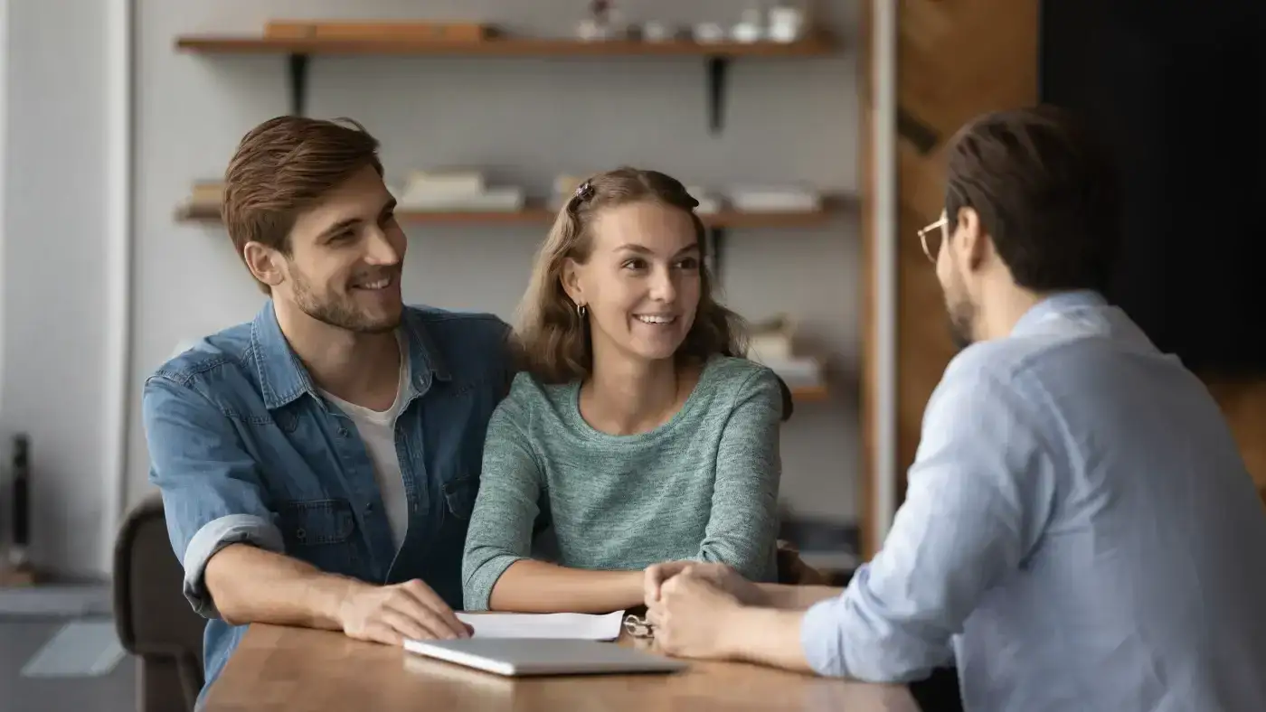 A close view of an in-progress at-home consultation with younger homeowners.
