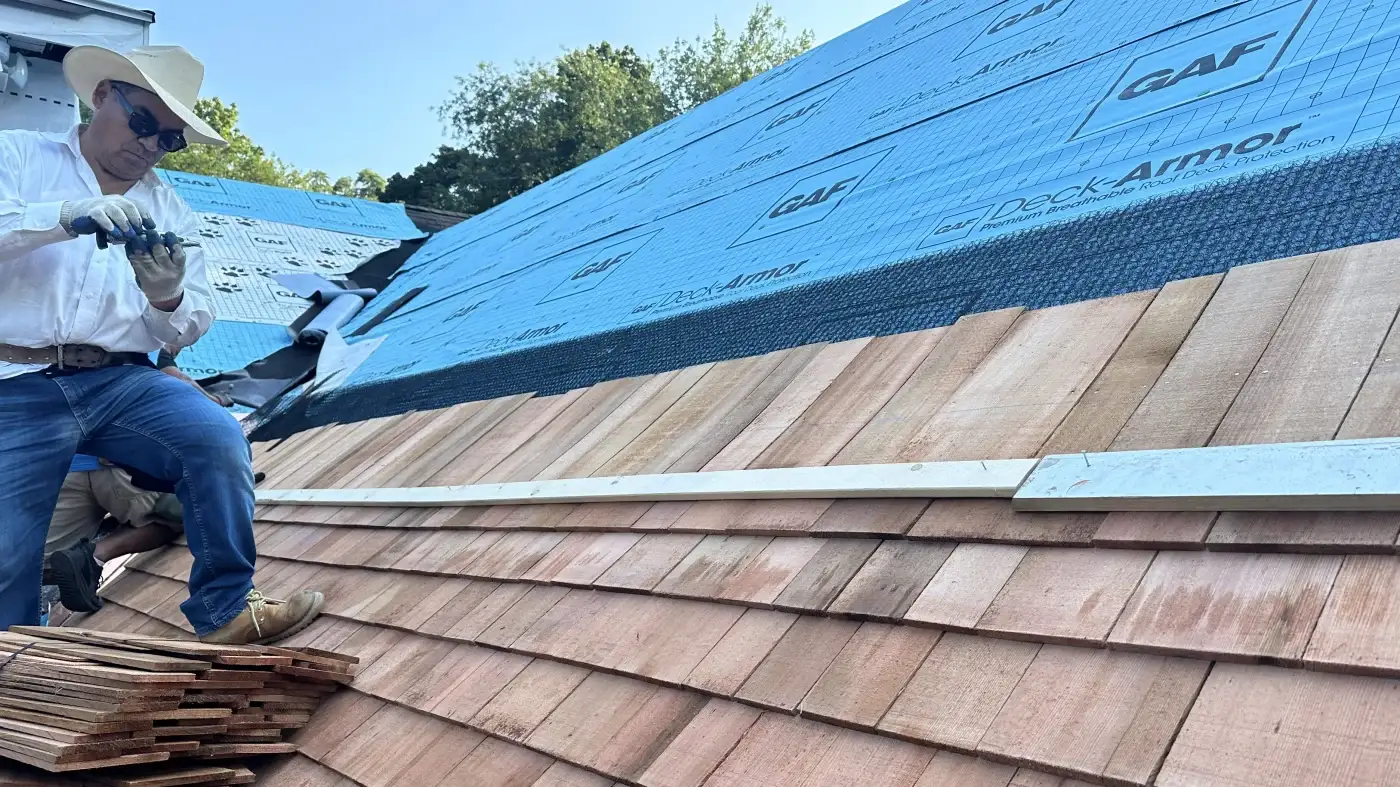 A close shot of a Sound Renovation crew member during a cedar roof installation.
